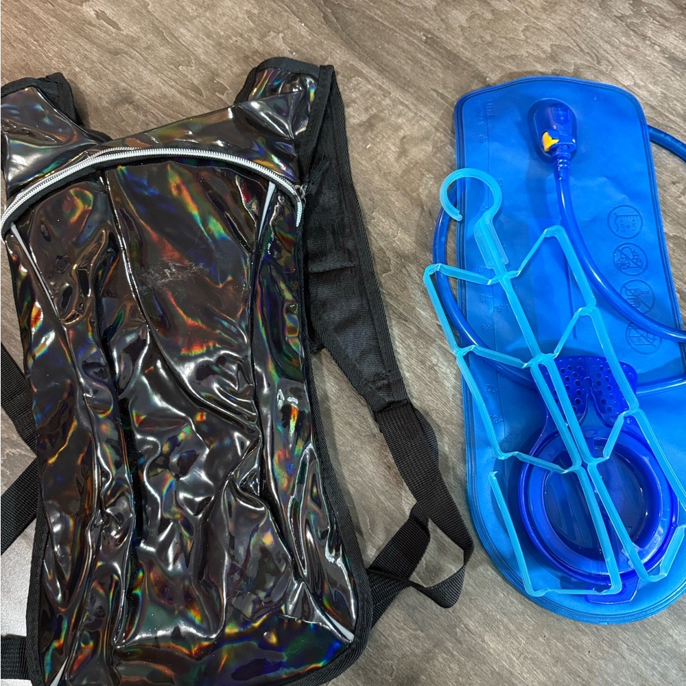 Iridescent/Holo 2L Hydration Backpack with Blue water and insulation for ice!!
